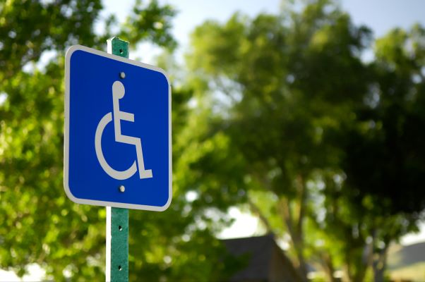 blue parking sign for people with a disability
