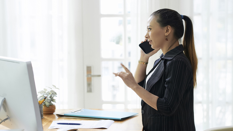 Female social worker on the phone.