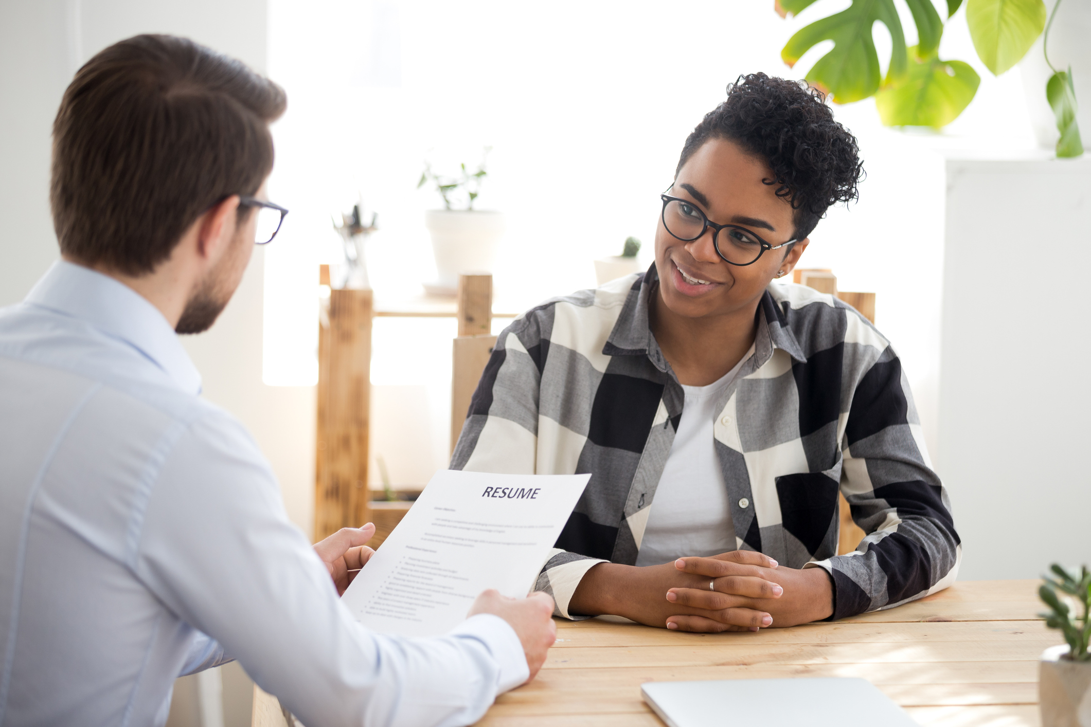 man holds resume talks with woman